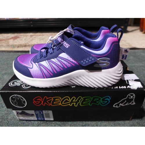 3140 - Pair of kid's navy and purple Skechers trainers - size 2 * This lot is subject to VAT