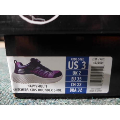 3140 - Pair of kid's navy and purple Skechers trainers - size 2 * This lot is subject to VAT