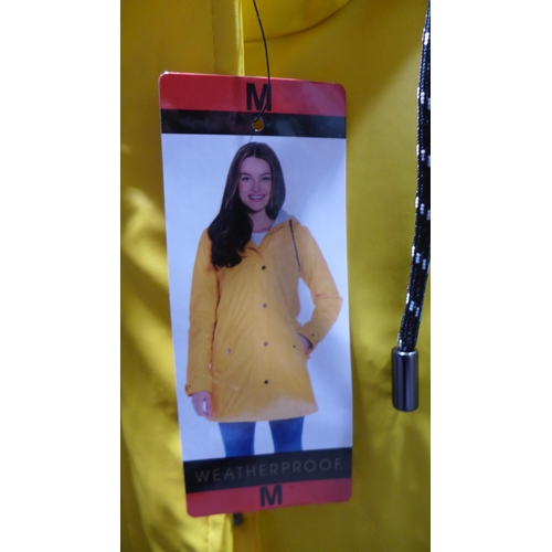 3221 - 2 x ladies weatherproof hooded rain jackets - size M yellow and purple * This lot is subject to VAT