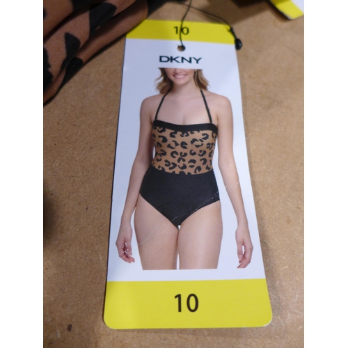 3254 - Five DKNY leopard print swimming costumes, size 10 *This lot is subject to VAT