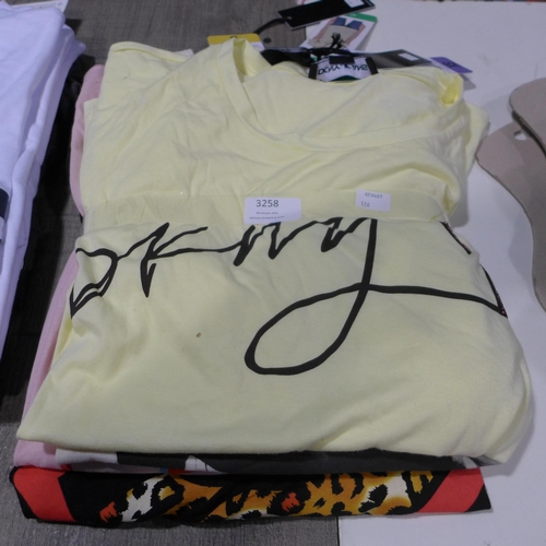 3258 - Four ladies T-Shirts incl. DKNY, mixed sizes, style and colours *This lot is subject to VAT