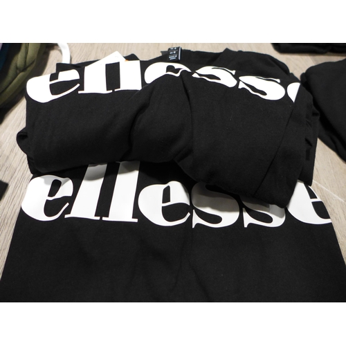 3264 - Five ladies black Ellesse T-Shirts, mixed sizes, 8 & 10  *This lot is subject to VAT