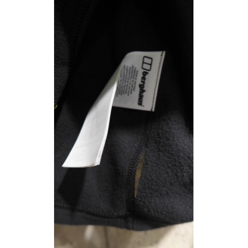 3276 - Two men's black Berghaus fleeces, sizes L and XXL - damaged *This lot is subject to VAT