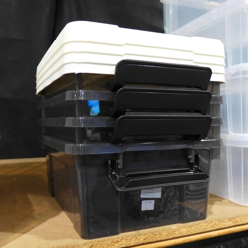 3413 - Four plastic storage boxes with lids