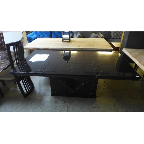 1602 - A black and white marble effect dining table