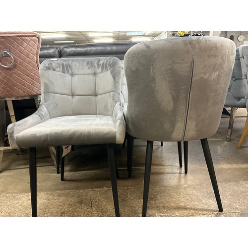 1374 - A set of four Kos grey velvet dining chairs * This lot is subject to VAT