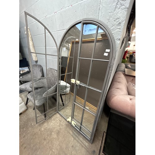 1414 - A large opening arched window mirror