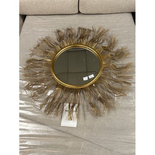 1434 - A gold sunburst mirror