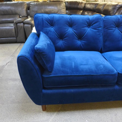 1551 - A Hoxton blue velvet three seater sofa RRP £799