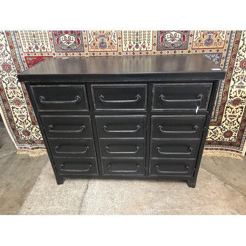 1436 - An industrial style bank of twelve drawers