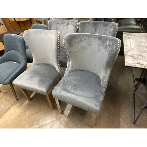 1504 - A pair of grey velvet dining chairs * This lot is subject to VAT