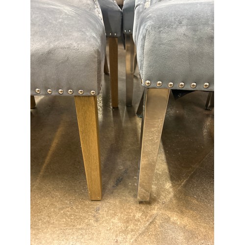 1504 - A pair of grey velvet dining chairs * This lot is subject to VAT