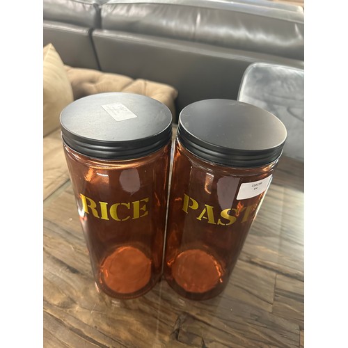 1467 - A set of rice and pasta amber glass storage jars - H 28cms (68429808)