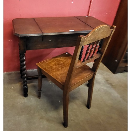 249A - An Edward VII oak desk and a chair