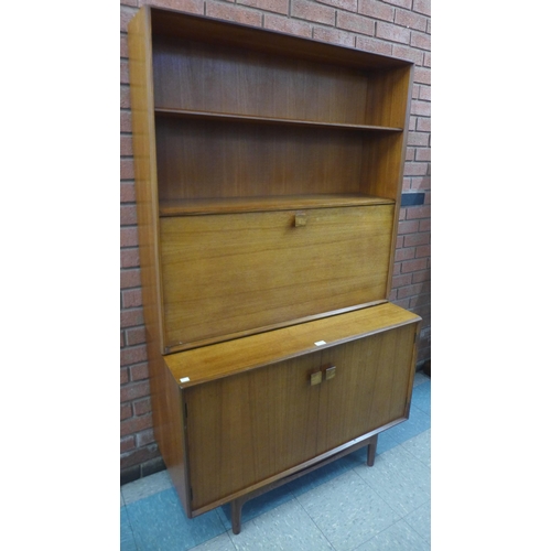 100 - A G-Plan Danish Design teak bookcase, designed by Ib Kofod Larsen