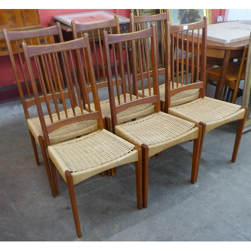 125 - A set of six Danish Mogens Kold teak and cord seated dining chairs, designed by Arne Hovmand Olsen