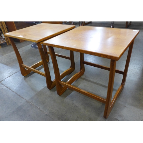 127 - A pair of teak occasional tables