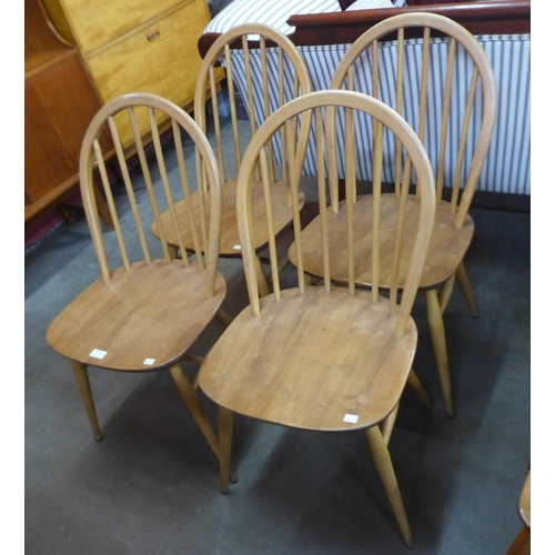 139 - A set of four Ercol Blonde elm and beech Windsor chairs