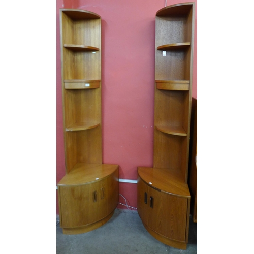 141 - A pair of G-Plan Fresco teak corner cabinets