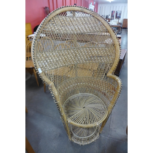 145 - An Italian wicker peacock chair