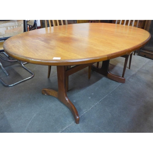 148 - A G-Plan Fresco teak dining table and four chairs