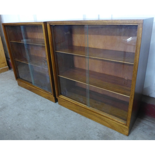 149 - A pair of Morris of Glasgow tola wood bookcases