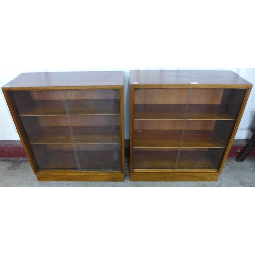 149 - A pair of Morris of Glasgow tola wood bookcases