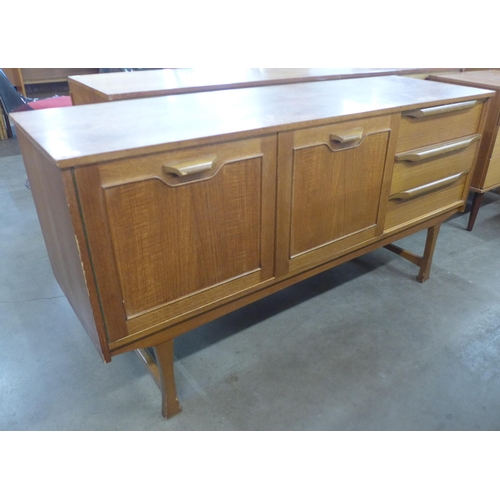 164 - A teak sideboard