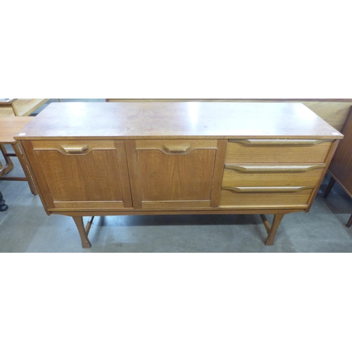 164 - A teak sideboard