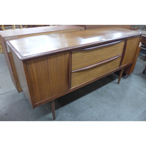 181 - A small teak sideboard