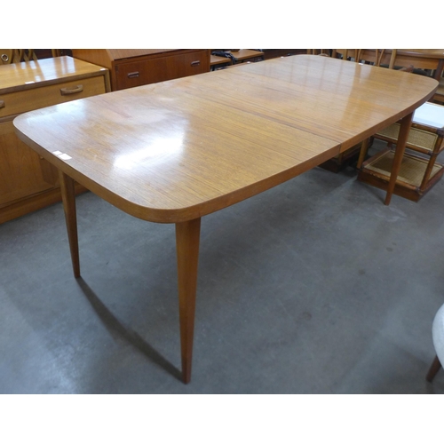 182 - A Swedish teak extending dining table