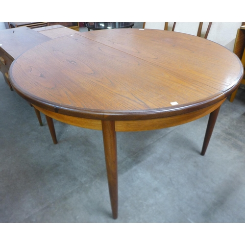 193 - A G-Plan Fresco teak circular extending dining table