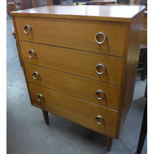 210 - A teak chest of drawers