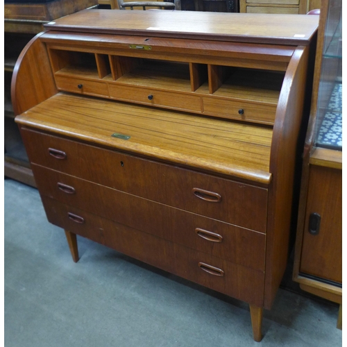 222 - A Swedish SMI teak cylinder desk, designed by Egon Ostergaard