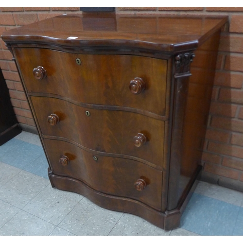 235 - A 19th Century French mahogany serpentine chest of drawers