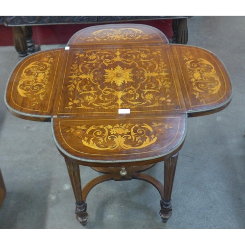 242 - A 19th Century French rosewood and marquetry inlaid drop-leaf gueridon table