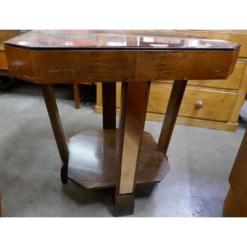 253 - An Art Deco peach mirrored glass coffee table