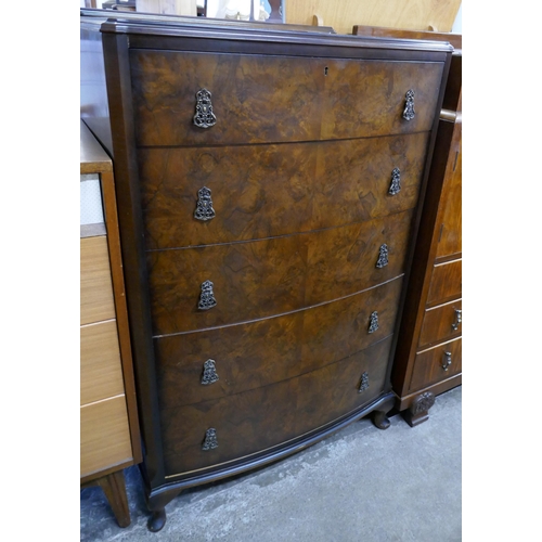 255 - A George III style burr walnut bow front chest of drawers