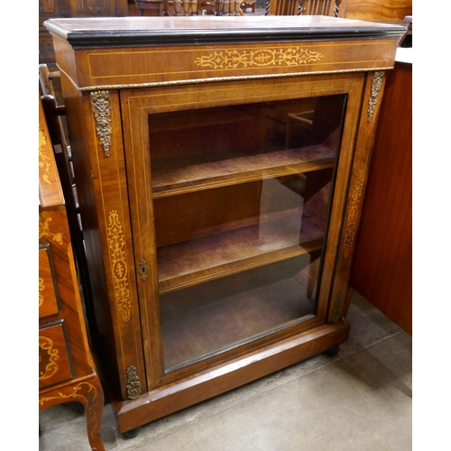 258 - A Victorian inlaid walnut pier cabinet