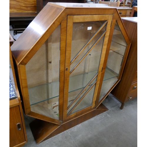 259 - An Art Deco walnut octagonal display cabinet