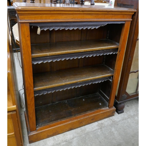 260 - A Victorian walnut open bookcase