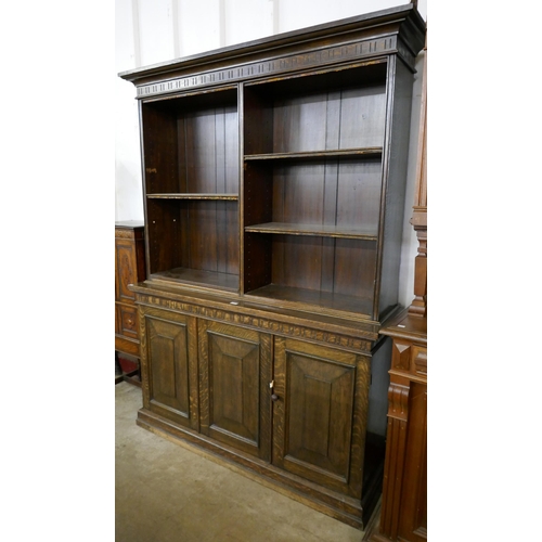 276 - A late Victorian oak bookcase