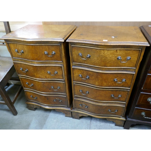 293 - A pair of small burr walnut serpentine chests of drawers