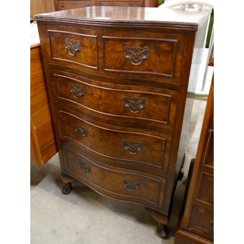 323 - A small burr walnut serpentine chest of drawers