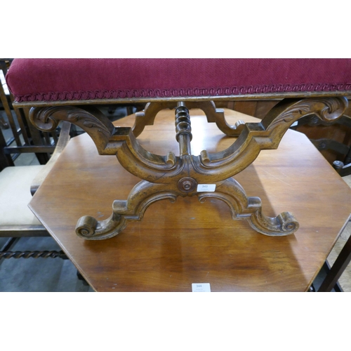 343 - A Victorian carved walnut x-frame stool