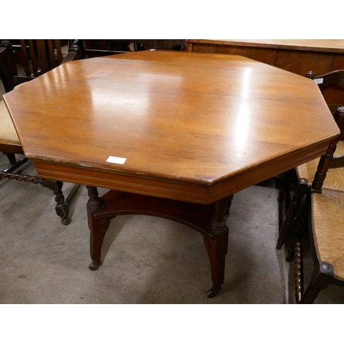 344 - A Victorian Aesthetic Movement walnut octagonal centre table