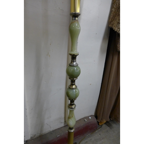 395 - A brass and onyx standard lamp