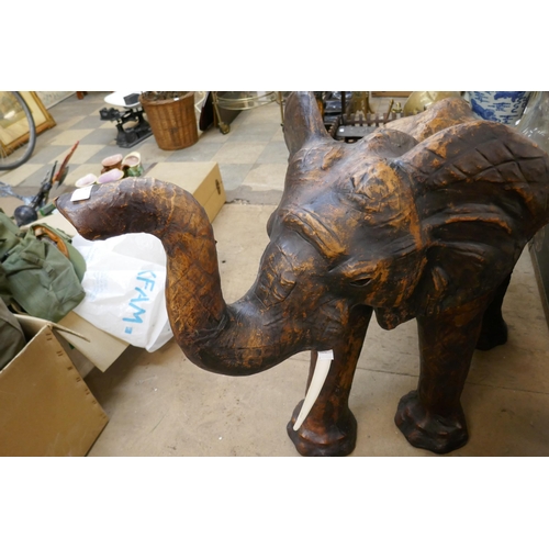 420 - A large leather figure of a baby elephant