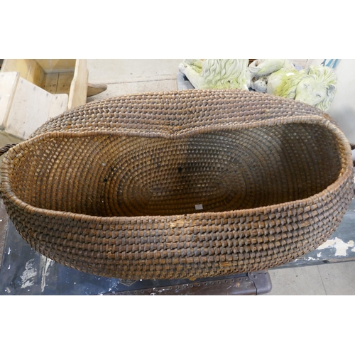 421 - A wicker lidded basket and two trunks