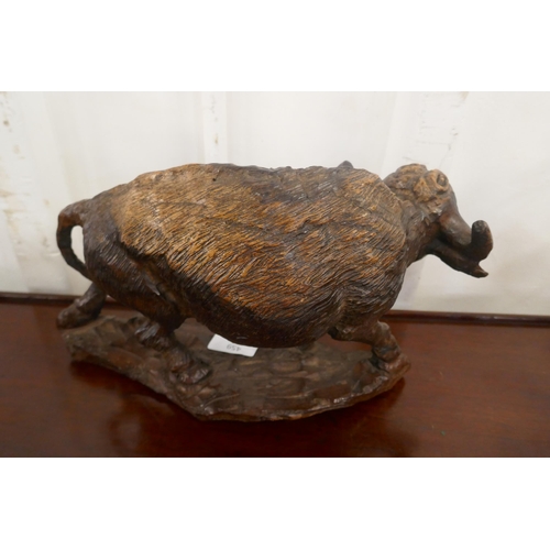 459 - A Black Forest carved wood buffalo